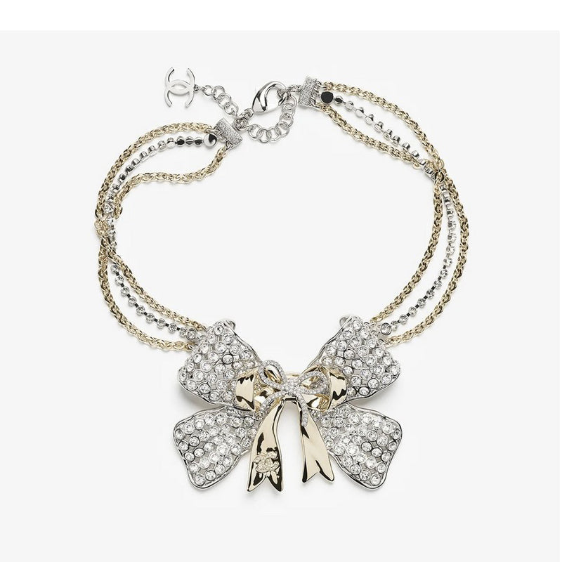 18K  Chanel 25K Bow Tie Choker Necklace