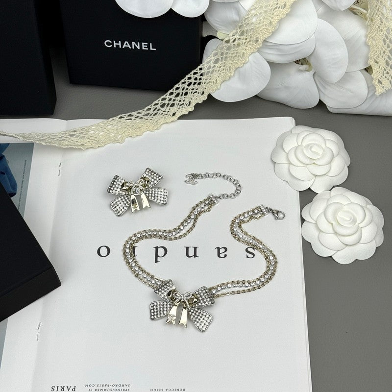 18K  Chanel 25K Bow Tie Choker Necklace