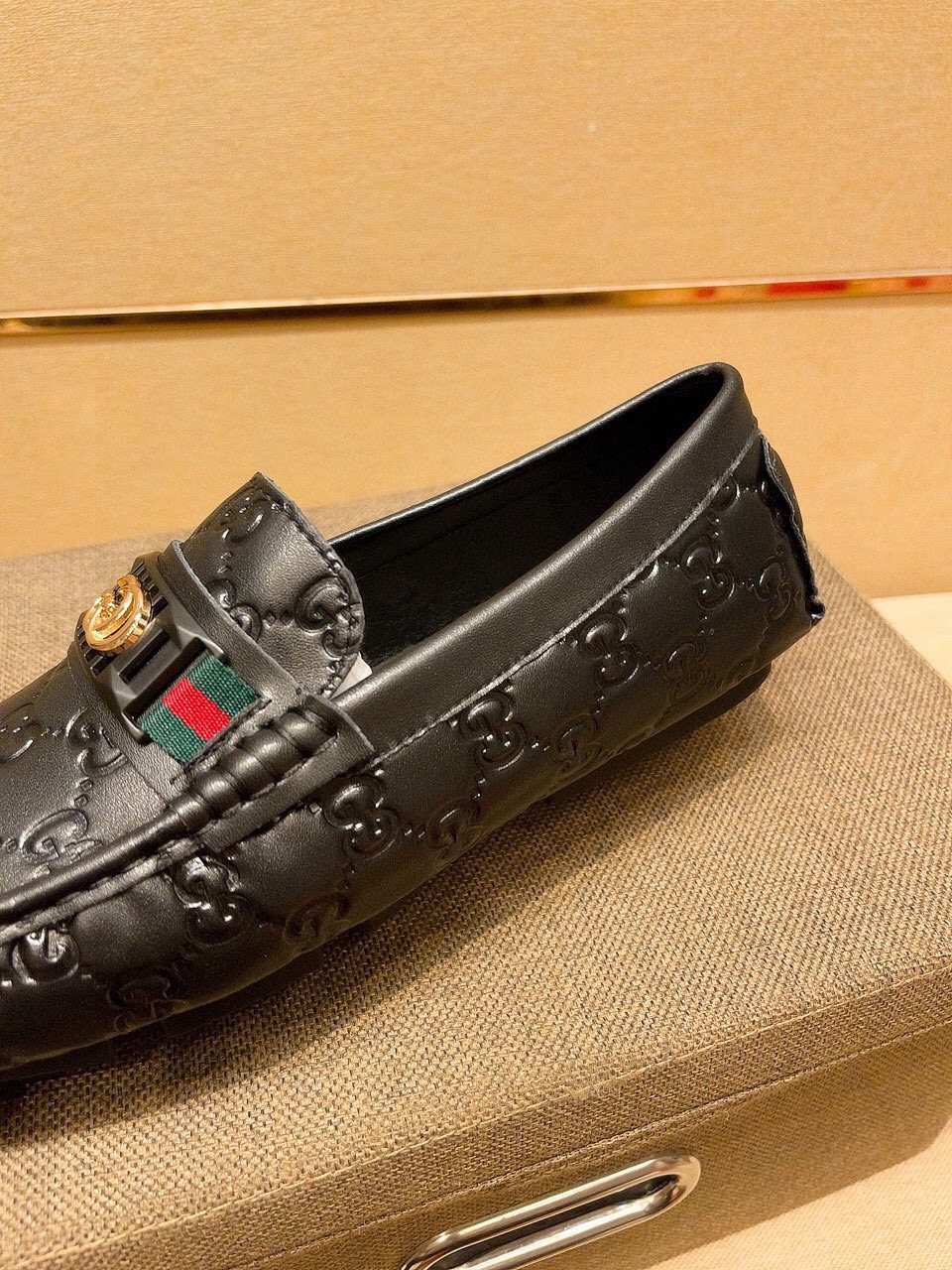 Gucci Black Embossed Loafers — detail