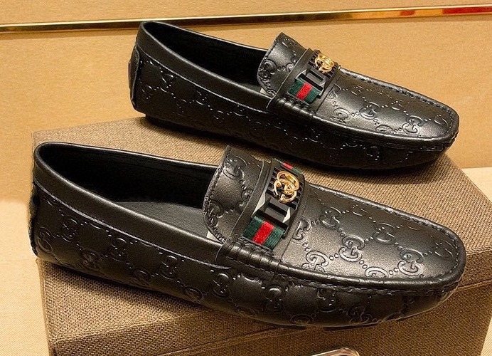 Gucci Black Embossed Loafers — front