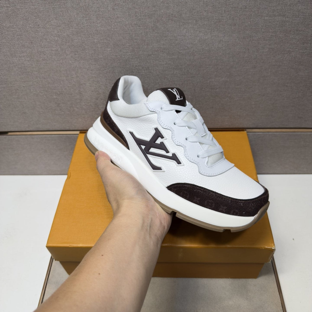 Louis Vuitton Contrast-Trim Low-Top Sneakers — model