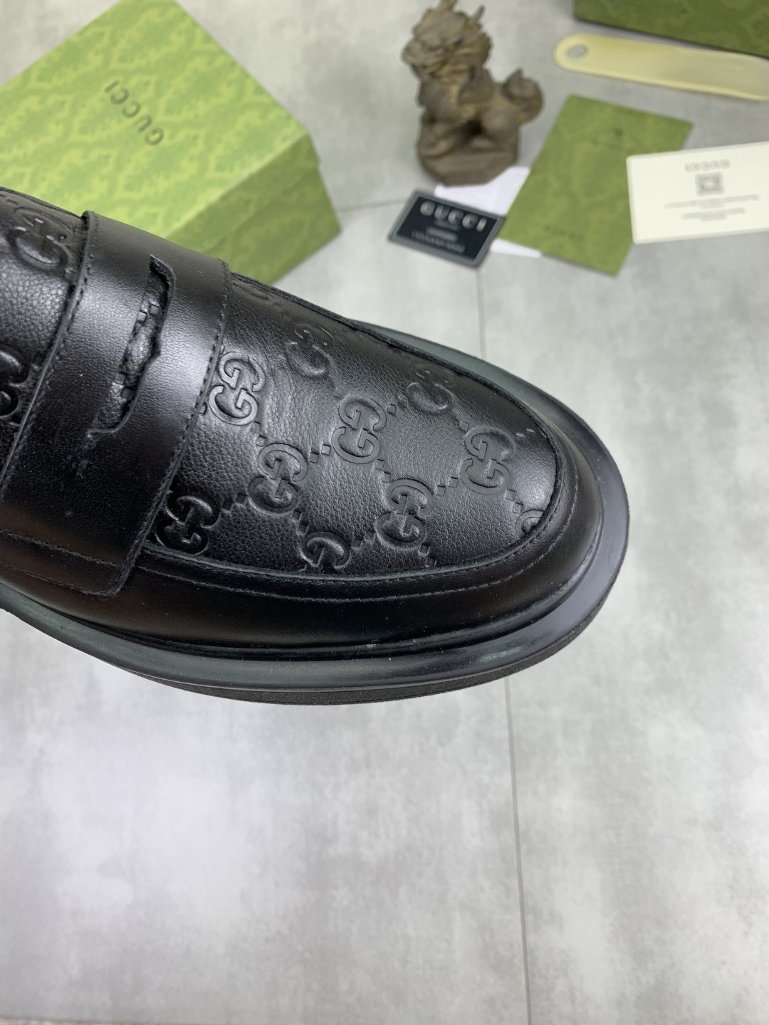 Gucci Black Embossed-Toe Loafers — detail