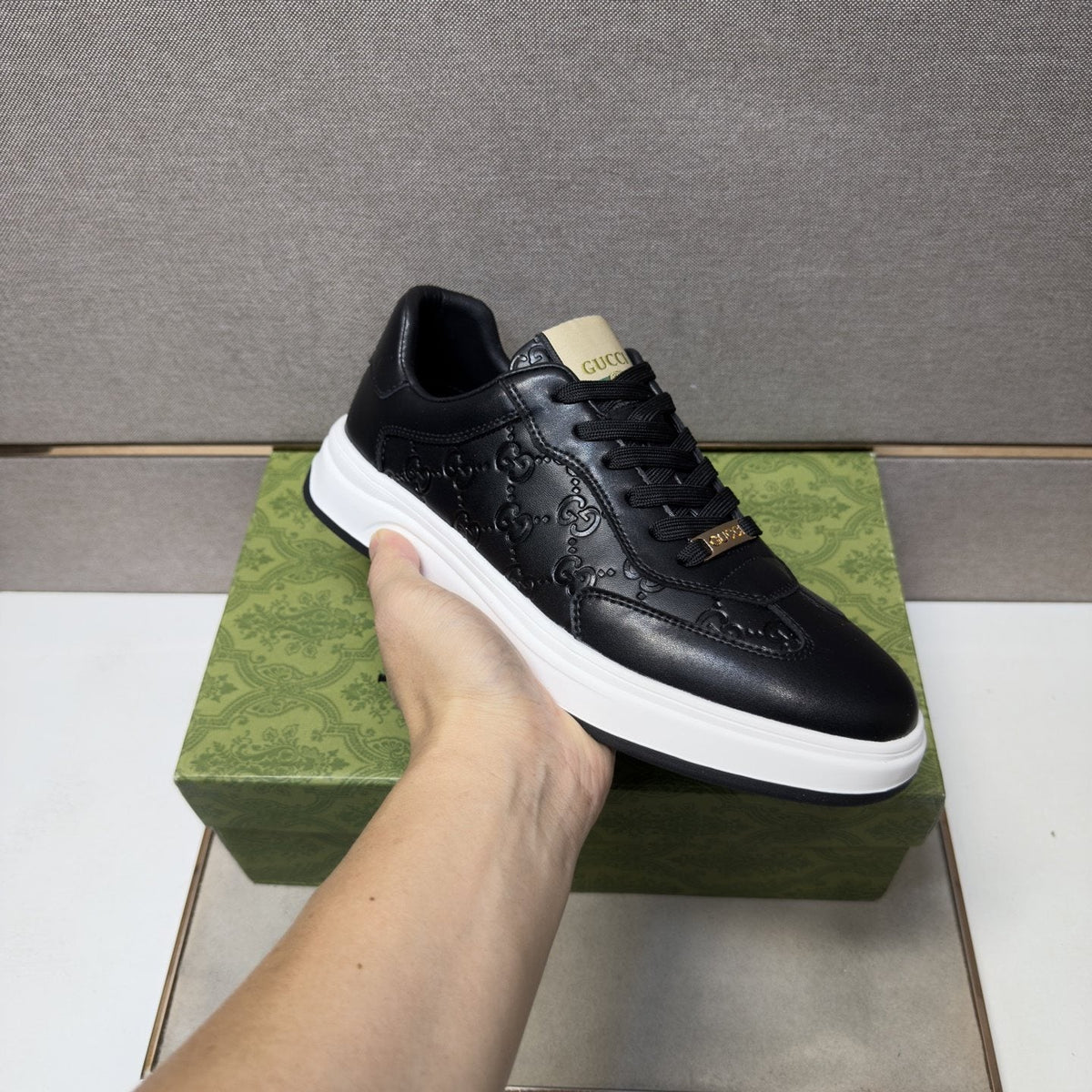 Gucci Men's Embossed Low-Top Sneakers — model