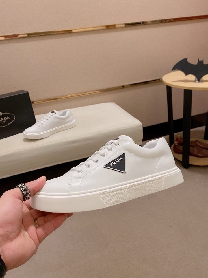 Prada Plaque Low-Top Sneakers — model